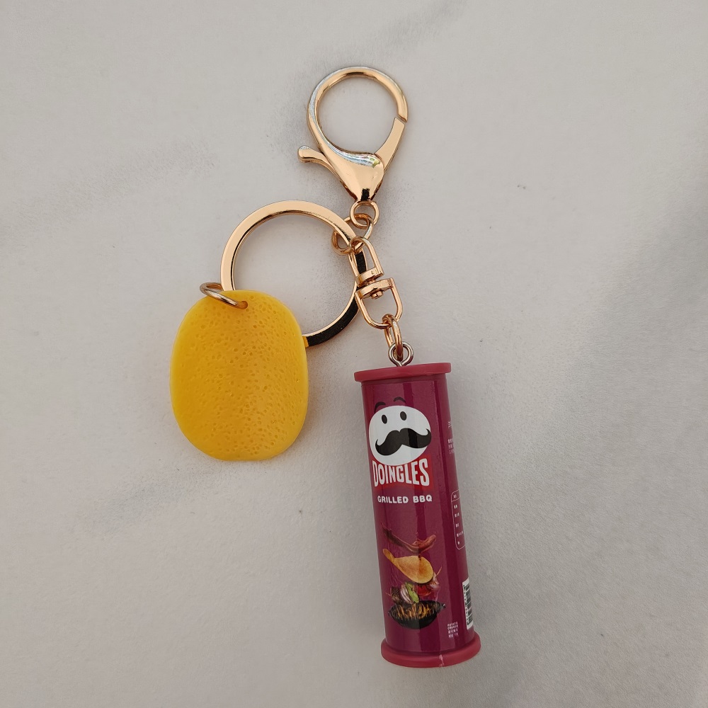 سلسلة مفاتيح رقاقة البطاطس الإ - مراجعة Gaming Console Keychain وسعره